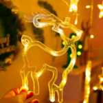 Гірлянда Штора з формами дзвіночок, ялинка, олень 12 PCS light — фото 3