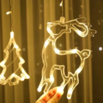 Гірлянда Штора з формами дзвіночок, ялинка, олень 12 PCS light — фото 2